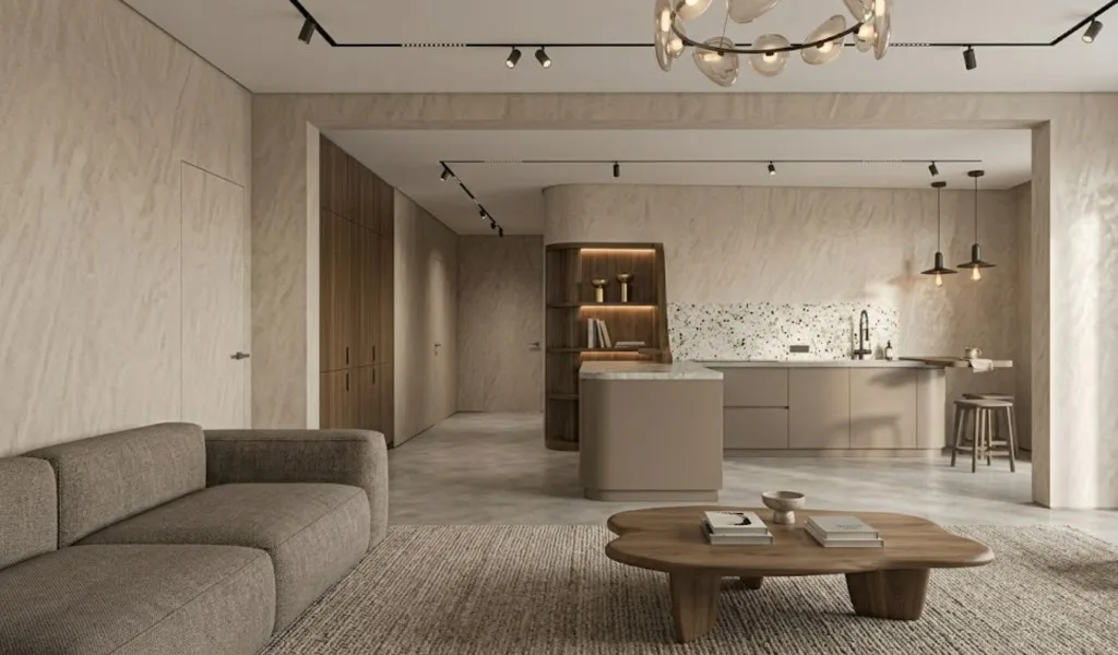 Warm, minimalistisch appartement met een terrazzokeuken, gebogen planken en een sculpturale glazen kroonluchter