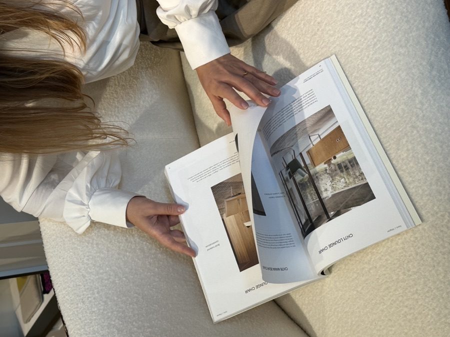 Browsing a furniture catalogue at home